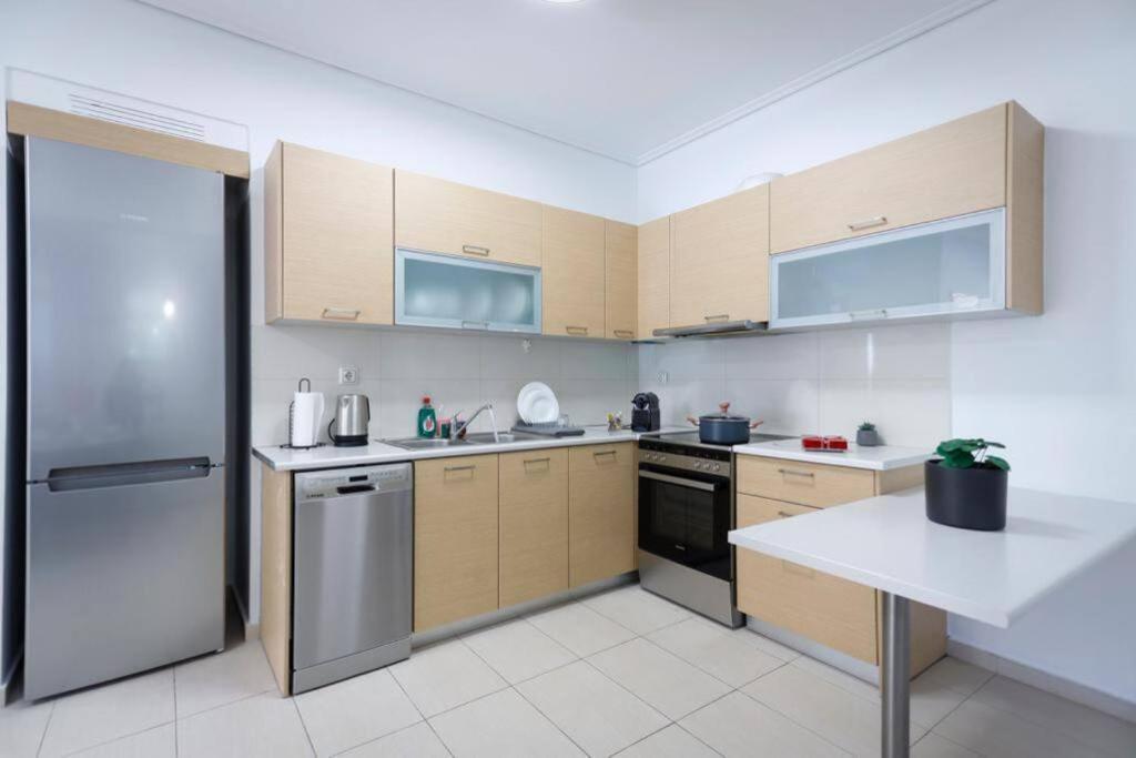 Pame Rentals - Cozy Glyfada Stay With Free Parking Athena Bagian luar foto